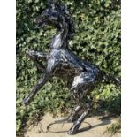 CONTEMPORARY SCHOOL GARDEN STATUE, rearing stallion, 127cm H, stylised metal.