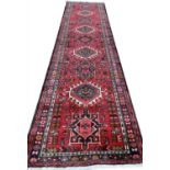 PERSIAN KARAJA RUNNER, 283cm x 74cm.