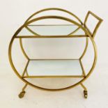 COCKTAIL TROLLEY, French art deco style, gilt metal and glass, 75cm x 70cm x 34cm.