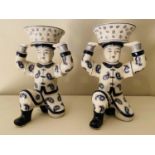 SERVING DISHES, a pair, in the form Chinese gentleman holding rice baskets moft, ceramic, 33cm x