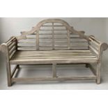LUTYENS STYLE GARDEN BENCH, silvery weathered teak of substantial slatted construction after a