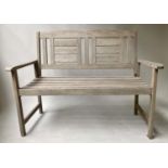 GARDEN BENCH, weathered teak with arched lattice back and flat top arms, 120cm W.