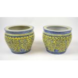 JARDINEIRES, a pair, yellow ground with foliate blue decoration, 30cm h x 35cm diam. (2)