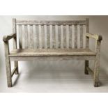 'SWAN HATTERSLEY' GARDEN BENCH, weathered teak of substantial slatted construction, 122cm W.