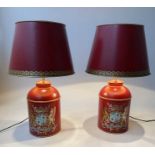 TOLEWARE LAMPS, a pair scarlet toleware canister form with Royal coat of arms and matching shades,