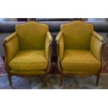 BERGERES, 79cm H x 65cm, a pair, French beechwood, circa 1920, with cushion seats in olive green