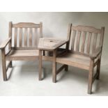 GARDEN CONVERSATION BENCH BY SWANN HATTERSLEY, weathered teak with integral table, 167cm W.