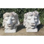 HEADS OF LIONS PLANTERS, a pair, faux Portland stone 40cm x 43cm x 36cm. (2)