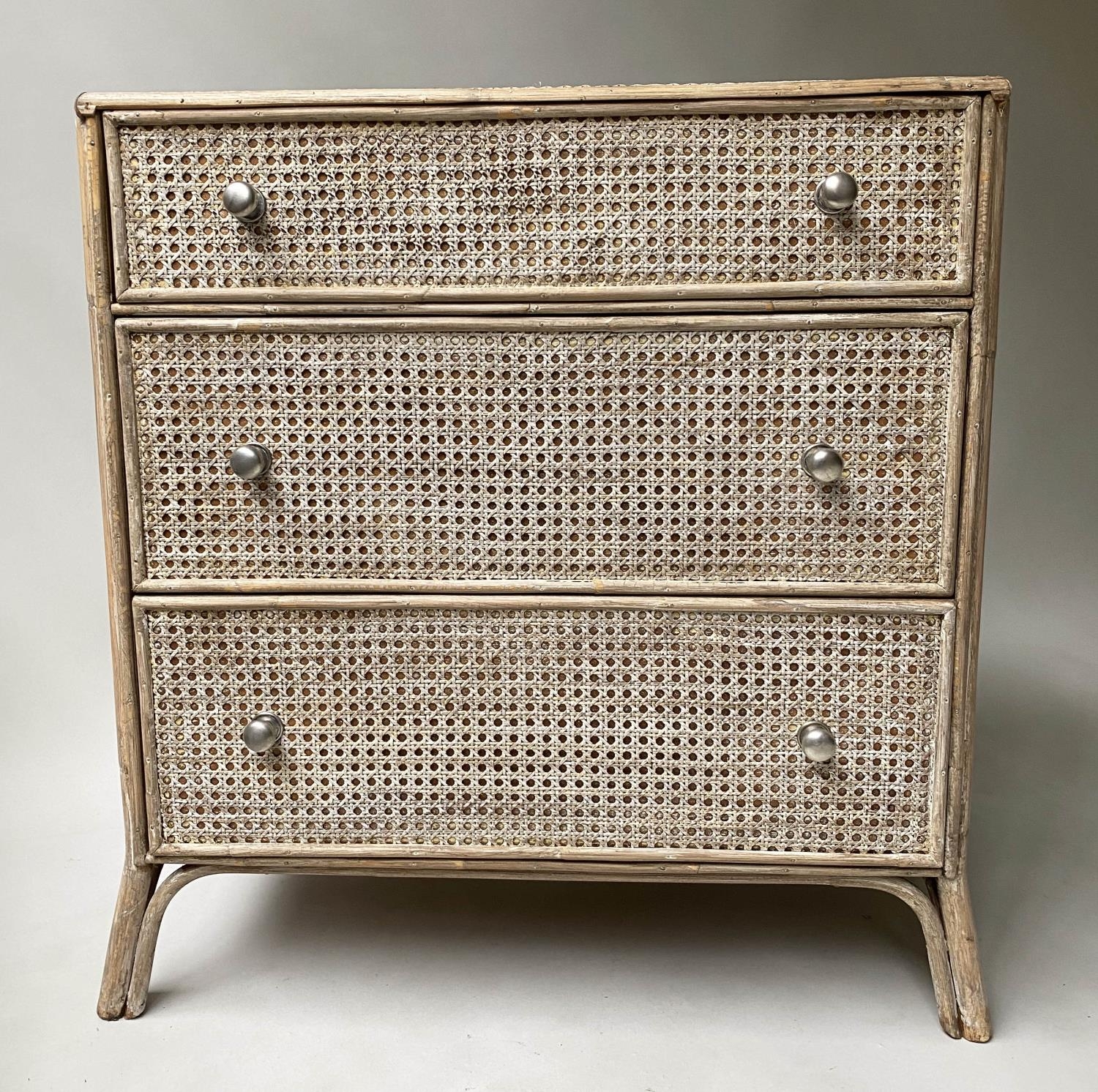 CHEST, bamboo framed with three long cane panelled drawers, 68cm x 76cm H x 48cm.