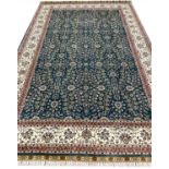 FINE PURE SILK HEREKE RUG, 241cm x 154cm.