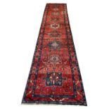 ANTIQUE PERSIAN HERIZ RUNNER, 440cm x 100cm.