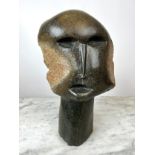MANNER OF HENRY MOORE (British 1898-1986), serpentine stone bust, indistinctly signed to verso, 40cm