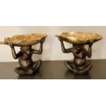 SERVING DISHES, 33cm x 40cm x 18cm, each in the form of a monkey holding a banana leaf. (2)