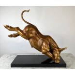 RAGING BULL SCULPTURE, 20th century patinated gilt metal on a marble base, 62cm H x 65cm.