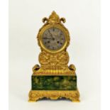 MANTEL CLOCK, early 19th century French ormolu, ornately chased with faux malachite base signed