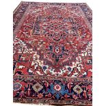 ANTIQUE PERSIAN HERIZ CARPET, 353cm x 260cm.