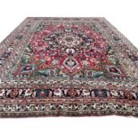 ANTIQUE PERSIAN DOROKHSH CARPET, 337cm x 268cm.