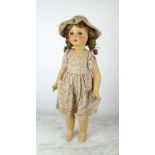 DOLL, mid 20th century, with walking and blinking mechanism, 70cm H.