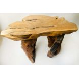 ROOT GARDEN TABLE, weathered yewwood tree section and root support, 134cm x 70cm x 74cm H.