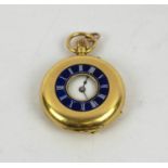 18CT GOLD LADIES FOB WATCH, blue enameled surround to outer cover and Roman numerals, white enameled