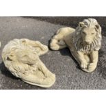 RECUMBENT LIONS, a pair, composite stone, 35cm H x 60cm x 35cm. (2)