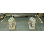 ELEPHANT BASE LOW TABLE, 150cm x 62cm x 50cm, glass top on carved marble bases.