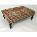 KILIM HEARTH STOOL, attributed to George Smith, raised on turned supports, 39cm H x 105cm x 76cm.