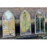 ARCHITECTURAL GARDEN MIRRORS, a set of three, Gothic style aged metal frames, 122x56. (3)