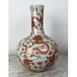 CHINESE DRAGON BOTTLE VASE, of good size, orange and white ceramic, 55cm H.
