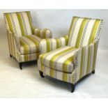 ARMCHAIRS, a pair, contemporary striped woven fabric raised on ebonised supports and castors, 90cm H
