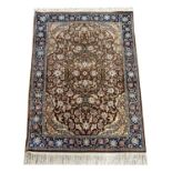 HEREKE SILK RUG, 172cm x 94cm.