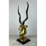 BRONZE KUDU HEAD, Hollywood Regency circa 1970's, gilt bronze with a square marble base, 81cm H.