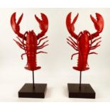 SURREALIST STYLE SCULPTURAL LOBSTERS, a pair, each 56cm high, 22cm wide, 15cm deep, raised on