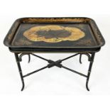 TRAY ON STAND, 76cm W x 55cm d x 48cm H, Regency tole with black and gilt shell design on a