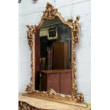 CONSOLE TABLE AND MIRROR, 228cm H x 128cm W, Rococo style gilt framed with arched plate, marble