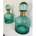 DECANTERS, a pair, 38cm H x 22cm diam., Murano style green glass with gilt metal necks (2)