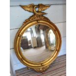 CONVEX MIRROR, 80cm H x 57cm W, 20th century Italian giltwood with eagle surmount.