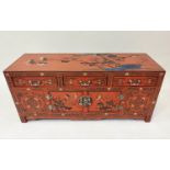 LOW CHINESE SIDE CABINET, early 20th century scarlet lacquered with incised decoration, two cupboard