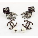 CHANEL EARRINGS, two pairs, one pair in black enamel, abstract design with white stones stones;