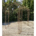 ARCHITECTURAL GARDEN ARBOUR, Fleur-de-Lys decoration, aged metal finish, 240cm high, 240cm long,