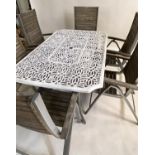 GARDEN TABLE AND CHAIRS, rectangular pierced cast aluminium with six folding metal framed and teak