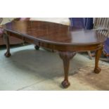 DINING TABLE, circa 1900, mahogany with oval gadrooned top, three extra leaves and winder, 72cm H