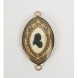 MOURNING BROOCH, 19th Century, yellow metal case and a bone silhouette plaque of a gentleman,