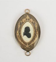 MOURNING BROOCH, 19th Century, yellow metal case and a bone silhouette plaque of a gentleman,