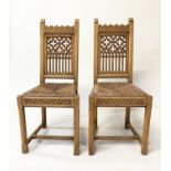 HALL CHAIRS, a pair 19th century Gothic oak castellated in the 'Strawberry Hill' style with rush