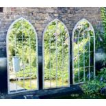 ARCHITECTURAL GARDEN MIRRORS, a set of 3, aged metal frames, 160x67. (3)