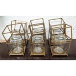 LANTERNS, a set of six, gilt skeleton framed with glass jar inserts, 28cm H. (6)