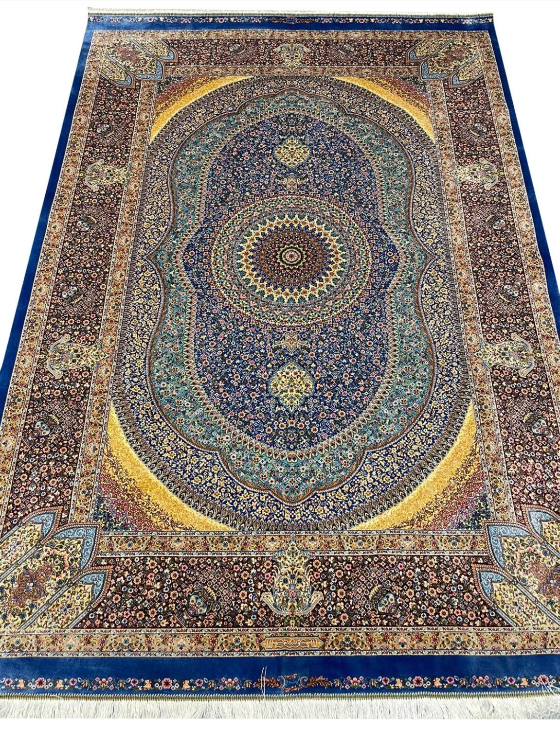 FINE SILK QUM DESIGN RUG, 195cm x 135cm.