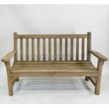LISTER GARDEN BENCH, weathered teak of substantial slatted construction with flat top arms