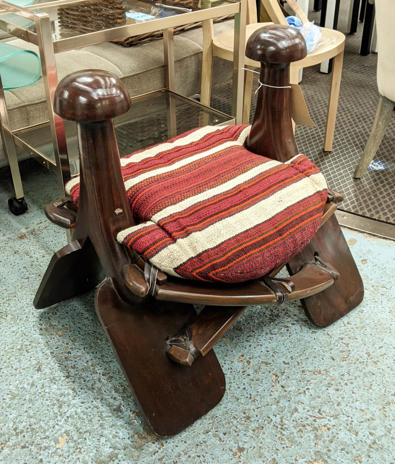 CAMEL SADDLE, contemporary, with kilim seat cushion, 70cm x 70cm x 58cm.